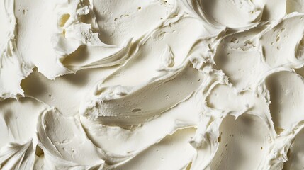 Delicious close up of white frosting perfect for culinary displays and tempting desserts