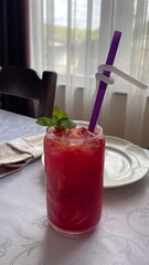 homemade freshly squeezed grapefruit juice with ice and mint