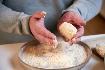 potato cutlets in breadcrumbs , cooking process