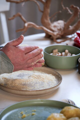 potato cutlets in breadcrumbs , cooking process