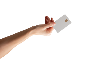 Female hand holding a blank credit card, showcasing it as a symbol of payment, promotion, or banking service. Isolated on white background.