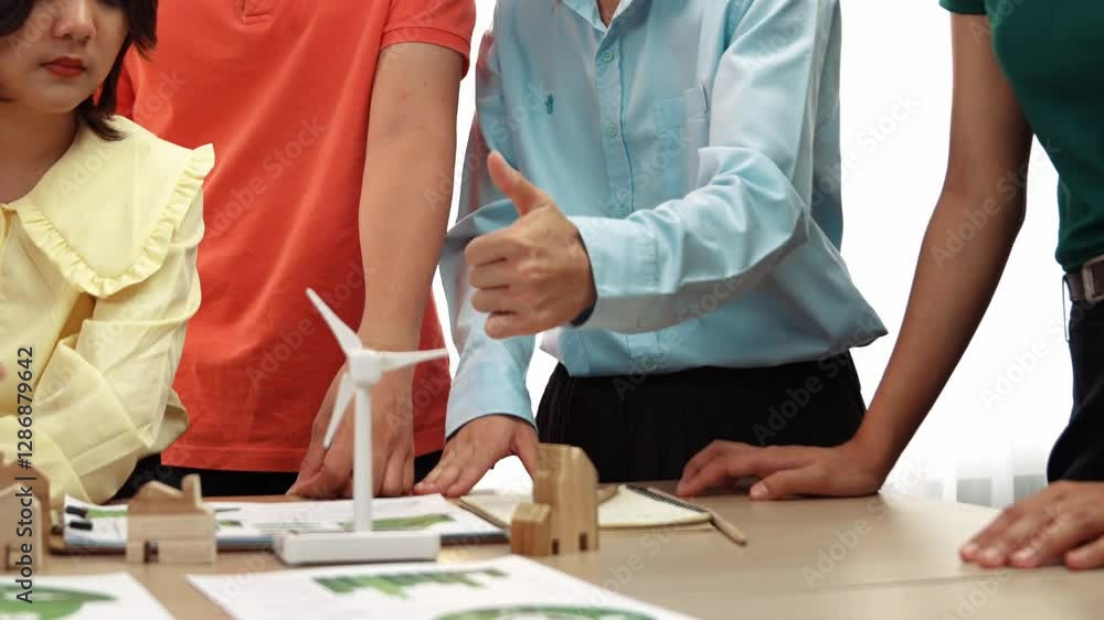 Poster manager recommend alternative energy to team for company's esg. windmill model represented using cle