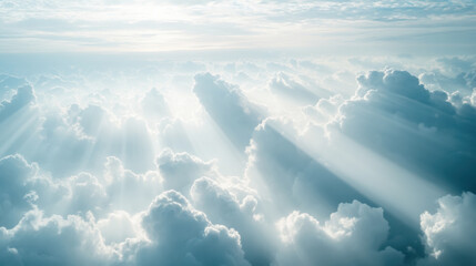 Fototapeta premium Majestic cloudy sky with sunlight rays creating a serene atmosphere
