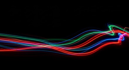 Chromatic Light Dance, A Vibrant Long Exposure Abstract Against Darkness