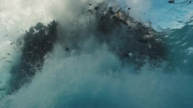 Environmental crisis highlighted as massive garbage patch in ocean destroys marine habitats and wildlife during a storm, showcasing urgent need for action and awareness to protect ecosystems