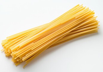 Fresh Spaghetti Noodles on a White Surface Perfect for Cooking and Recipe Presentations in Culinary Arts and Italian Cuisine