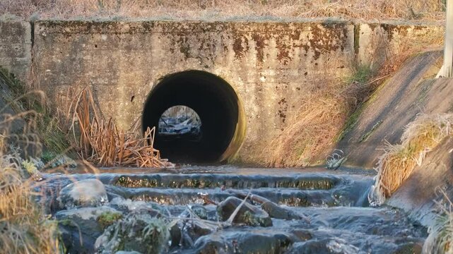 Concrete Culvert Tunnel Carrying a Water Stream Under Road or Railway