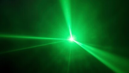 Abstract green laser light beams create a futuristic technology background with dynamic energy.