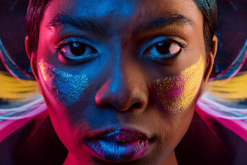 Neon Glow Portrait &ndash; Futuristic Woman with Vibrant Face Paint, Cyberpunk Aesthetic, and Immersive Light Effects