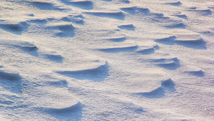 Naklejka premium Abstract volumetric pattern on snow on ice in winter