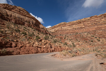 The Moki Dugway on Utah Highway 261 is a steep section of switchbacks going down a Cedar Mesa with beautiful views of valley below.