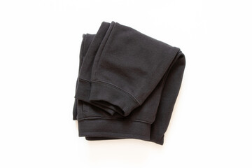 Black cotton sports pants on white background
