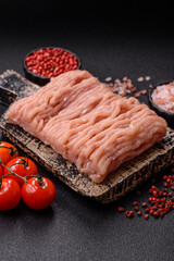 Raw minced chicken with salt, spices and herbs