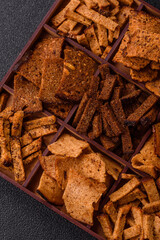 Crispy homemade brown bread chips with seeds and grains