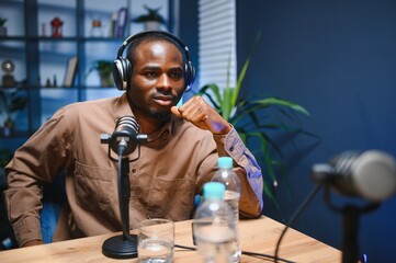 Handsome African American podcast host. Record a podcast or video blog