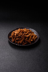 Crispy homemade brown bread crackers or croutons with seeds and grains