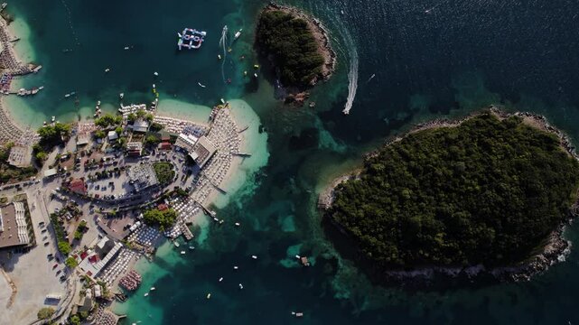 Cinematic revealing shot of Ksamil Islands, Albania. Aerial stunning scenery 4K drone footage. Albania, Ionian Sea