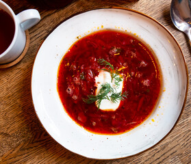 Russian borsch red soup with meat and sour cream