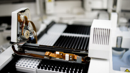 Close-up of an analyzer in a modern laboratory, showcasing precision and innovation in science. The concept of working with cutting-edge technologies in research processes.