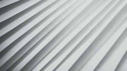 Fototapeta premium Fine ribbed grey paper texture with smooth light for background or design elements