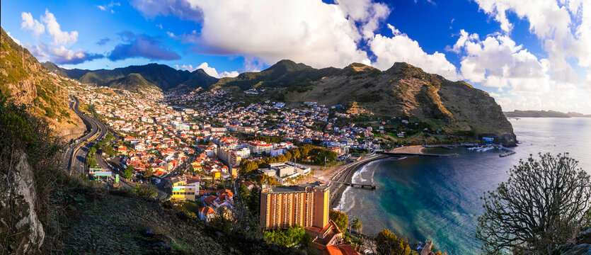 scenery of Madeira island, View of Machico town popular resort and beautiful bay with sandy beach. Eastern part of the island. Portugal travel.