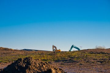empty marina with floating mooring buoys on calm water.