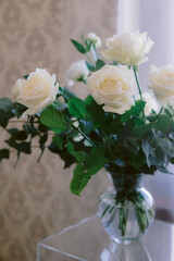 Elegant wedding reception with white floral decorations