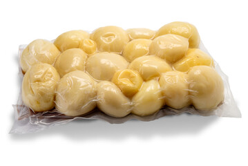 potatoes cooked vacuum-sealed in plastic tray for sous vide cooking, cut out