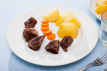 Steamed veal with potatoes and carrots. Diet food. High quality photo