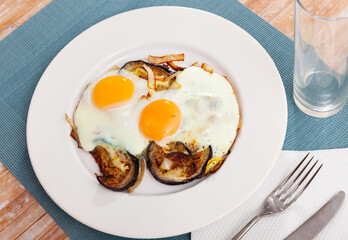 Vegan dish - fried eggplant with scrambled eggs