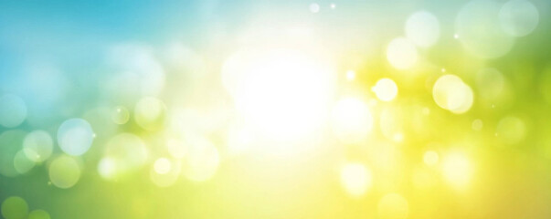 Obraz premium A fresh spring blue sunny sky background with blurred warm sunny glow. 