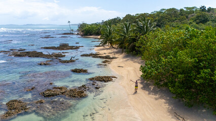 Drone Aerial view at sunrise of some beautiful hidden beach with cristal clear water in the island...