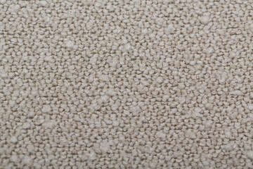 White beige gray sand boucle fabric swatch texture close-up for background or design element