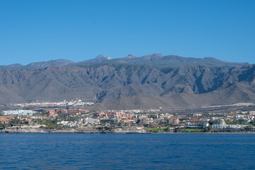 Hotels, resorts, beaches on South of Tenerife in Costa Adeje and Playa de las Americas, Canary islands, Spain in winter, view from ocean