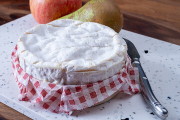French soft Camembert cheese, original Camembert de Normandie made from raw unpasteurised cow milk