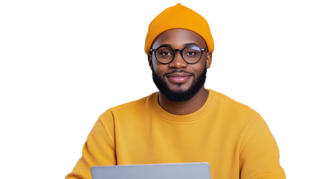 Man in yellow sweater and beanie working on a laptop on transparent background
