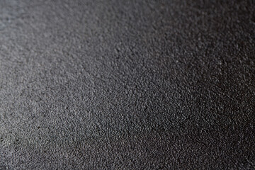 Black cast iron skillet macro detail for background