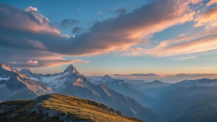 Obraz premium Serene Mountain Landscape with Dramatic Sky Colors at Sunset Over Lush Green Hills and Majestic Peaks in the Distance