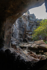 Waterfall through a cave