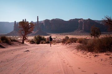 A man from behind in the monument valley