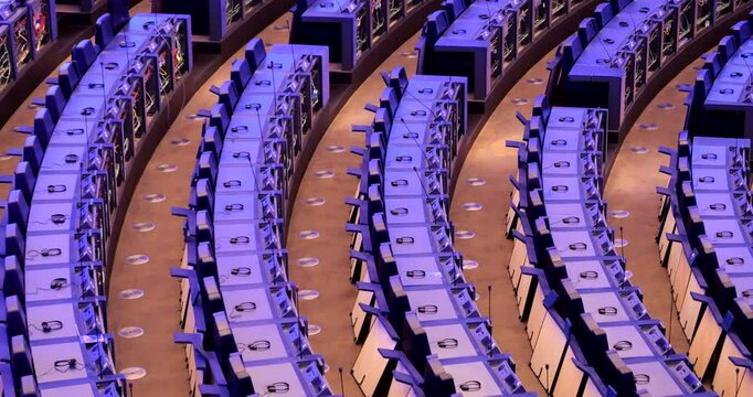 Rows of seats with open wiring in the European Parliament hemicycle are being prepared for the newly elected MEPs as election night results are announced in Strasbourg.