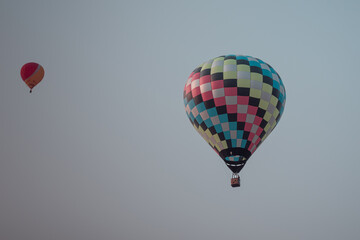 Naklejka premium Two hot-air balloons in the sky