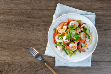 Spicy seafood salad, Thai spicy food recipe, Yum Spicy seafood on the tablewood
