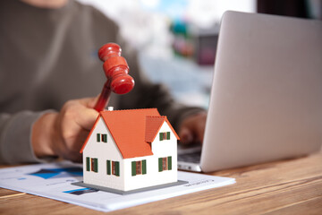 Staff auctioned small houses down to the hammer
