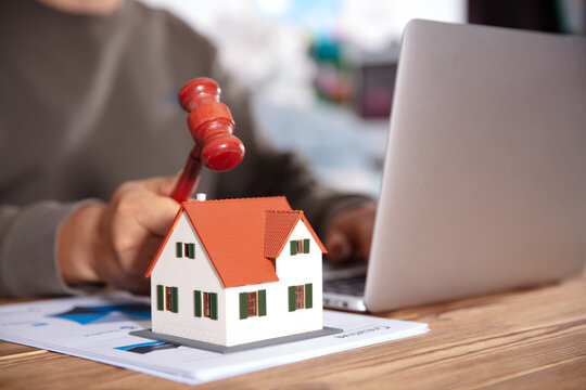 Staff auctioned small houses down to the hammer