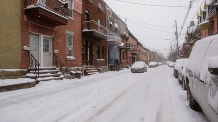 Wide angle of a Montreal snow-covered street 
