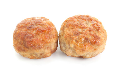 Two tasty cooked meatballs isolated on white