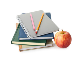 Stack of notebooks, pen, pencil and apple on white background