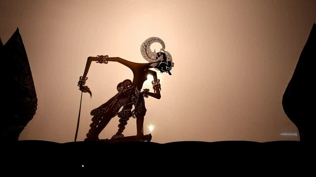 A dancing scene in a Wayang Kulit performance a traditional Javanese shadow puppet show in Indonesia