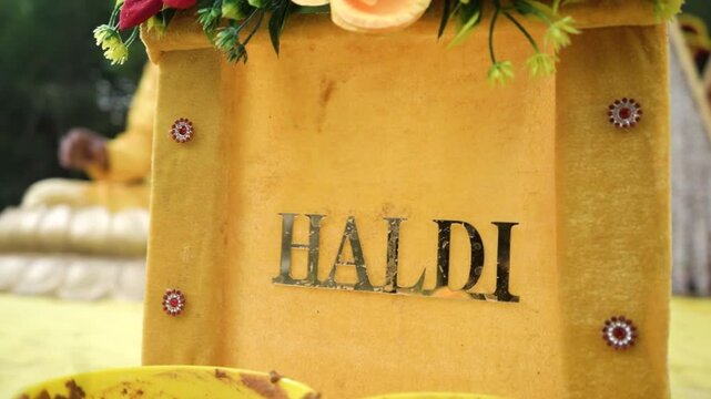 Cinematic Side View of Haldi Ceremony Decoration, Hindu Wedding Decoration of Haldi Stage, Indian Wedding Colorful Background